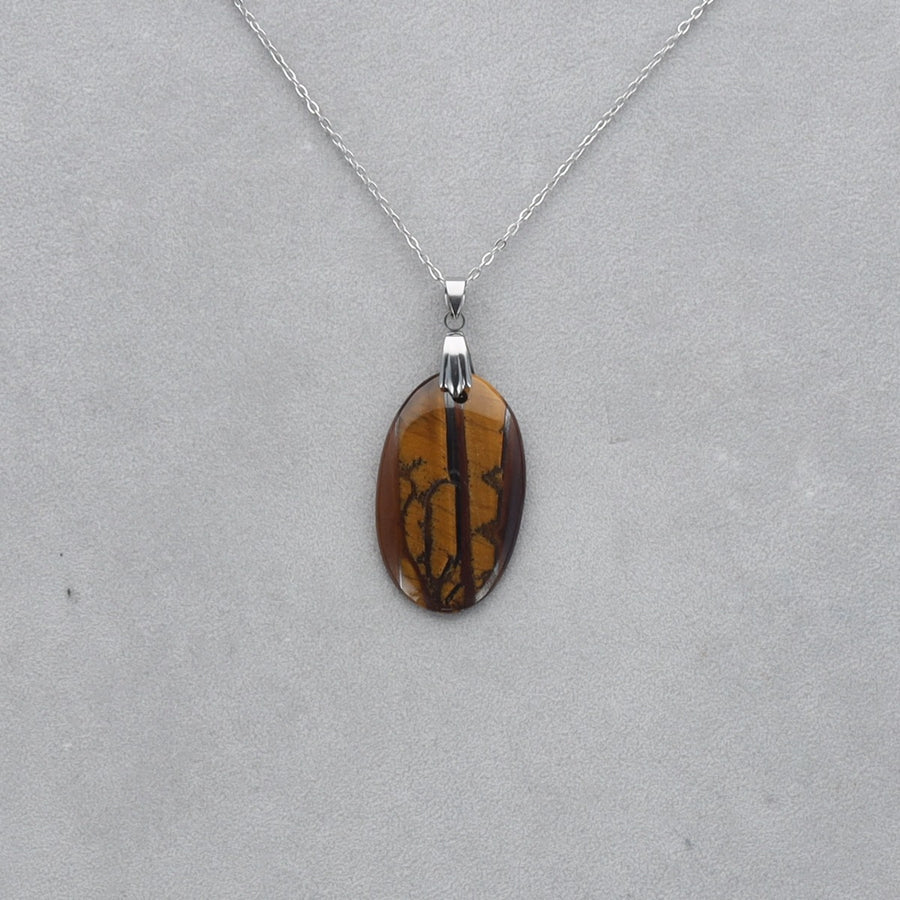 Oeil de Tigre Cabochon percé 57